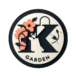 Logo KenGarden sin fondo es una K con una flor dentro de un circulo